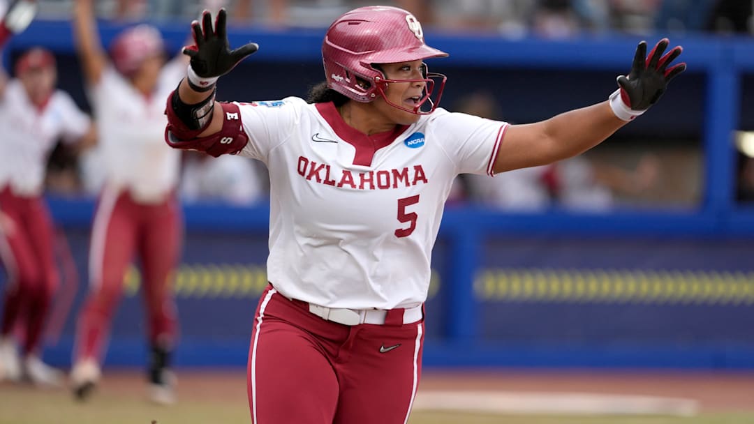 Oklahoma infielder Ella Parker (5) celebrates after hitting a walk-off home run to drive in three runs in the seventh inning of a Women's College World Series softball game between the Oklahoma Sooners (OU) and the Tennessee Volunteers at Devon Park in Oklahoma City in 2025. Parker hit two home runs Saturday in OU's win over Louisiana.