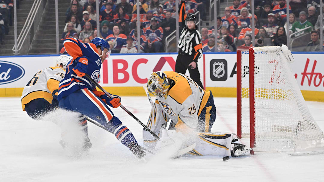 Mar 15, 2026; Edmonton, Alberta, CAN; Nashville Predators defenseman Brady Skjei (76) with Edmonton Oilers center Connor McDavid (97) goes for a shot on Nashville Predators goalie Justus Annunen (29) during the first period at Rogers Place. Mandatory Credit: Walter Tychnowicz-Imagn Images Mar 15, 2026; Edmonton, Alberta, CAN; Nashville Predators defenseman Brady Skjei (76) with Edmonton Oilers center Connor McDavid (97) goes for a shot on Nashville Predators goalie Justus Annunen (29) during the first period at Rogers Place. Mandatory Credit: Walter Tychnowicz-Imagn Images