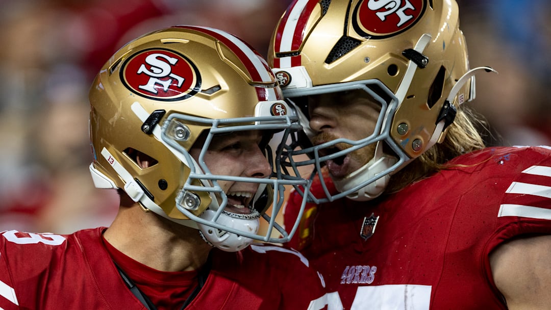 San Francisco 49ers quarterback Brock Purdy (L) and tight end George Kittle (R)