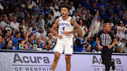 Jan 26, 2025; Memphis, Tennessee, USA; Memphis Tigers guard PJ Haggerty (4) reacts after a three point basket against the UAB Blazers during the second half at FedExForum. Mandatory Credit: Wesley Hale-Imagn Images