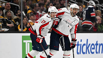 Feb 10, 2024; Boston, Massachusetts, USA; Washington Capitals center Dylan Strome (17) celebrates with left wing Alex Ovechkin (8) after scoring a goal against the Boston Bruins during the third period at the TD Garden. Mandatory Credit: Brian Fluharty-Imagn Images