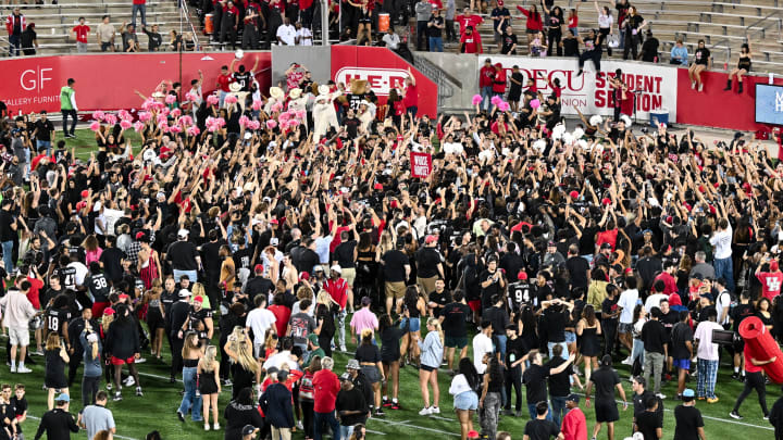 Oct 12, 2023; Houston, Texas, USA; Houston Cougars fans rush the field after the win over West