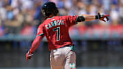 Aug 31, 2025; Los Angeles, California, USA;  Arizona Diamondbacks left fielder Corbin Carroll (7) celebrates as he rounds the bases on a three-run home run during the eighth inning off Los Angeles Dodgers relief pitcher Tanner Scott (66) at Dodger Stadium. Mandatory Credit: Jayne Kamin-Oncea-Imagn Images