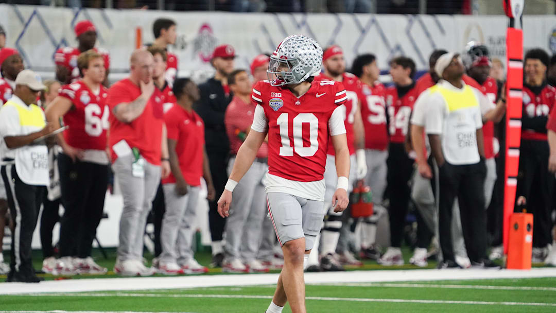 Dec 31, 2025; Arlington, TX, USA; Ohio State Buckeyes quarterback Julian Sayin (10) looks on during the fourth quarter against the Miami Hurricanes during the 2025 Cotton Bowl and quarterfinal game of the College Football Playoff at AT&T Stadium. Mandatory Credit: Raymond Carlin III-Imagn Images