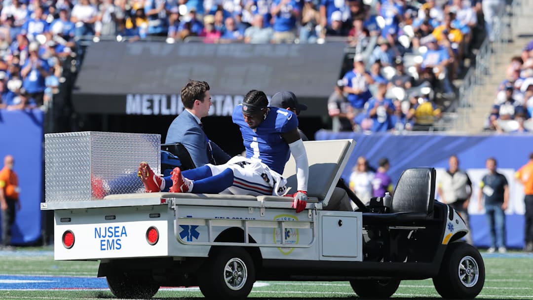 Sep 28, 2025; East Rutherford, New Jersey, USA;  New York Giants wide receiver Malik Nabers (1) is carted off the field following an injury . Injuries have been among the biggest frustrations the Giants have faced this season.