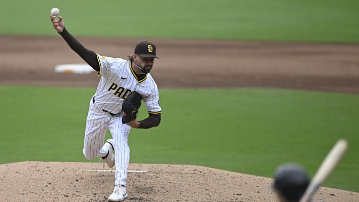 San Diego Padres relief pitcher David Morgan (66) delivers during the sixth inning against the Miami Marlins at Petco Park on May 28. San Diego Padres relief pitcher David Morgan (66) delivers during the sixth inning against the Miami Marlins at Petco Park on May 28.