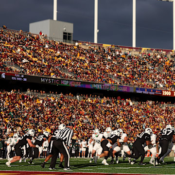 Nov 1, 2025; Minneapolis, Minnesota, USA; Michigan State Spartans runs a play against the Minnesota Golden Gophers during the second half at Huntington Bank Stadium. Mandatory Credit: Matt Krohn-Imagn Images