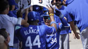 Jul 31, 2024; Chicago, Illinois, USA; Kansas City Royals catcher Freddy Fermin (34) celebrates with outfielder Dairon Blanco (44) after hitting a two-run home run against the Chicago White Sox during the second inning at Guaranteed Rate Field. Mandatory Credit: David Banks-USA TODAY Sports