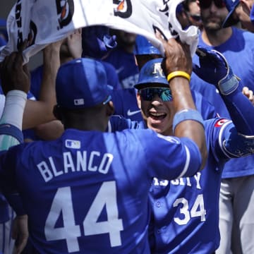 Jul 31, 2024; Chicago, Illinois, USA; Kansas City Royals catcher Freddy Fermin (34) celebrates with outfielder Dairon Blanco (44) after hitting a two-run home run against the Chicago White Sox during the second inning at Guaranteed Rate Field. Mandatory Credit: David Banks-USA TODAY Sports