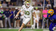 Nov 22, 2025; Atlanta, Georgia, USA; Georgia Tech Yellow Jackets quarterback Haynes King (10) scrambles against the Pittsburgh Panthers in the first quarter at Bobby Dodd Stadium at Hyundai Field. Mandatory Credit: Brett Davis-Imagn Images
