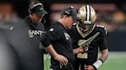 Oct 5, 2025; New Orleans, Louisiana, USA; New Orleans Saints head coach Kellen Moore talks to New Orleans Saints quarterback Spencer Rattler (2) against the New York Giants during the second quarter at Caesars Superdome. Mandatory Credit: Matthew Hinton-Imagn Images