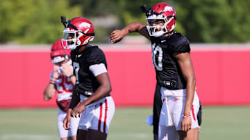 Arkansas Razorbacks quarterbacks KJ Jackson (7) and Taylen Green (10)