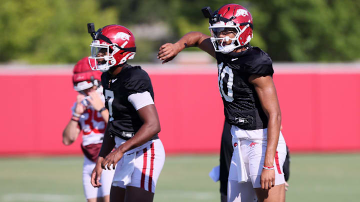 Arkansas Razorbacks quarterbacks KJ Jackson (7) and Taylen Green (10)