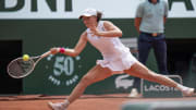 Jun 10, 2023; Paris,France; Iga Swiatek (POL) returns a shot during the French Open final against Karolina Muchova (CZE) on day 14 at Stade Roland-Garros. Mandatory Credit: Susan Mullane-USA TODAY Sports