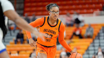 Oklahoma State guard Stailee Heard (32) looks to pass in the second quarter during an NCAA women’s basketball game between Oklahoma State and McNeese at Gallagher-Iba Arena in Stillwater, Okla., on Monday, Dec. 16, 2024.