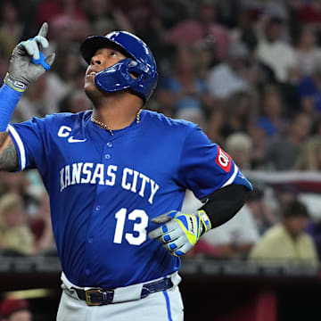 Jul 6, 2025; Phoenix, Arizona, USA; Kansas City Royals catcher Salvador Perez (13) celebrates after hitting a solo home run against the Arizona Diamondbacks in the fourth inning at Chase Field. Mandatory Credit: Rick Scuteri-Imagn Images