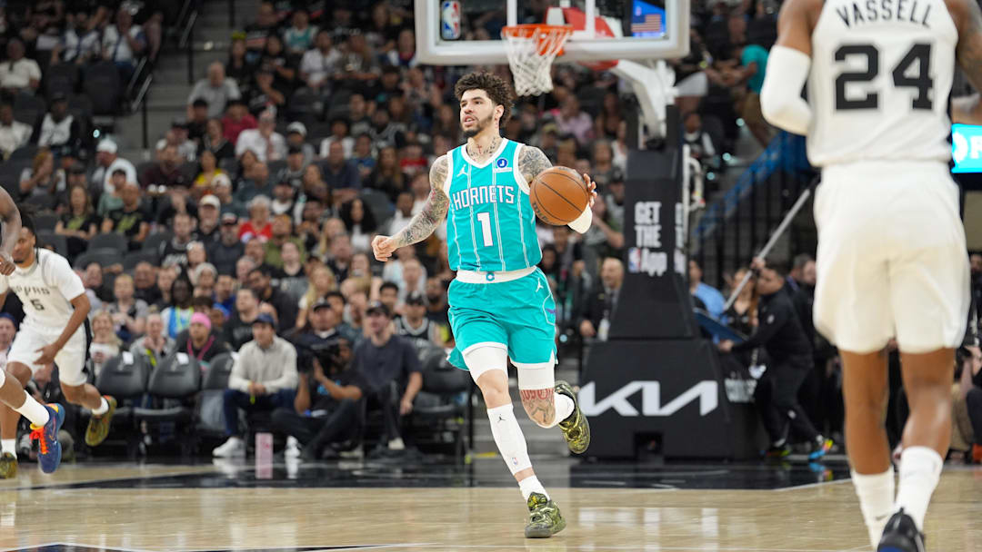 Charlotte Hornets guard LaMelo Ball (1) dribbles up the court in the first half 