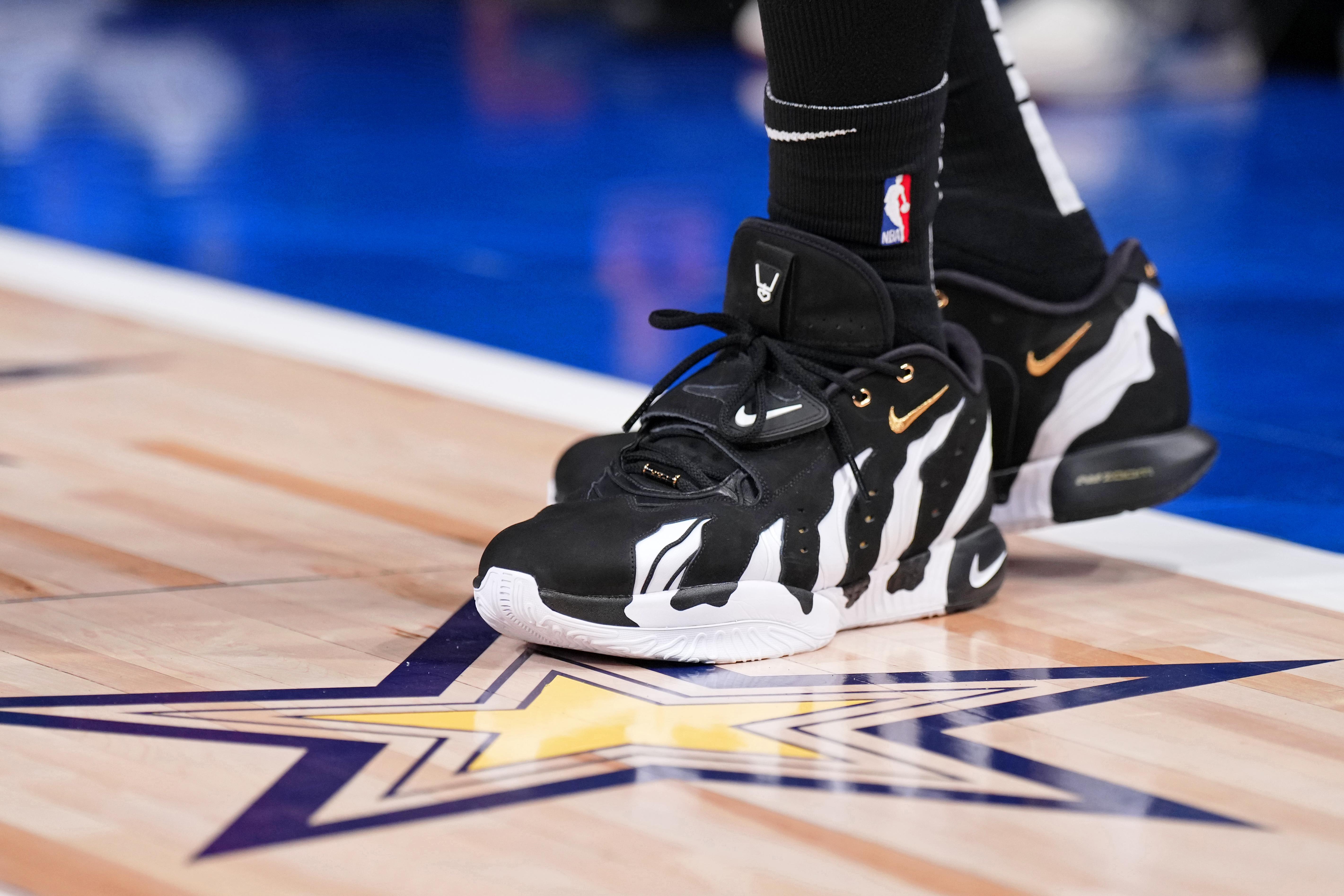 Los Angeles Lakers forward LeBron James' black and white Nike sneakers.