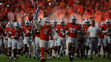 Aug 31, 2025; Miami Gardens, Florida, USA; The Miami Hurricanes take the field before the game against the Notre Dame Fighting Irish at Hard Rock Stadium. Mandatory Credit: Sam Navarro-Imagn Images