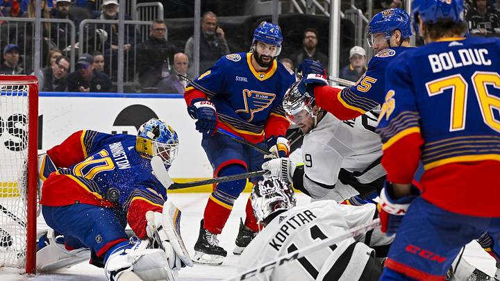 Mar 13, 2024; St. Louis, Missouri, USA;  Los Angeles Kings right wing Adrian Kempe (9) shoots and scores against St. Louis Blues goaltender Jordan Binnington (50) during the third period at Enterprise Center. Mandatory Credit: Jeff Curry-Imagn Images
