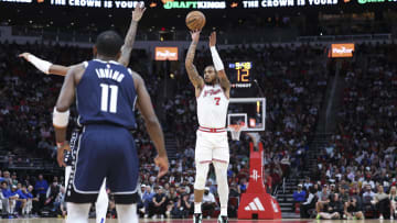 Mar 31, 2024; Houston, Texas, USA; Houston Rockets forward Cam Whitmore (7) shoots the ball during a game against the Dallas Mavericks