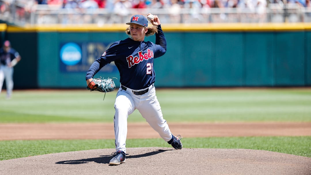 Jun 26, 2022; Omaha, NE, USA; Ole Miss pitcher Hunter Elliott (26) pitches during the first inning against the Oklahoma Sooners at Charles Schwab Field. Mandatory Credit: Jaylynn Nash-Imagn Images