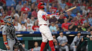 Sep 23, 2025; Philadelphia, Pennsylvania, USA; Philadelphia Phillies outfielder Kyle Schwarber (12) watches his home run during the first inning against the Miami Marlins at Citizens Bank Park. Mandatory Credit: Eric Hartline-Imagn Images