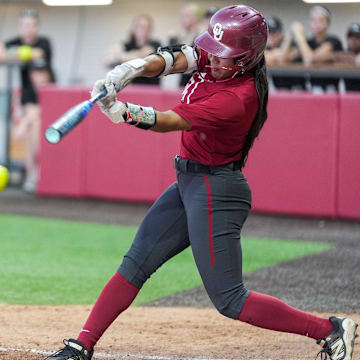 Oklahoma’s Ailana Agbayani hits a single during a fall ball scrimmage.