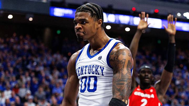 Feb 17, 2026; Lexington, Kentucky, USA; Kentucky Wildcats guard Otega Oweh (00) reacts after scoring a basket and being fouled during the second half against the Georgia Bulldog at Rupp Arena at Central Bank Center. Mandatory Credit: Jordan Prather-Imagn Images