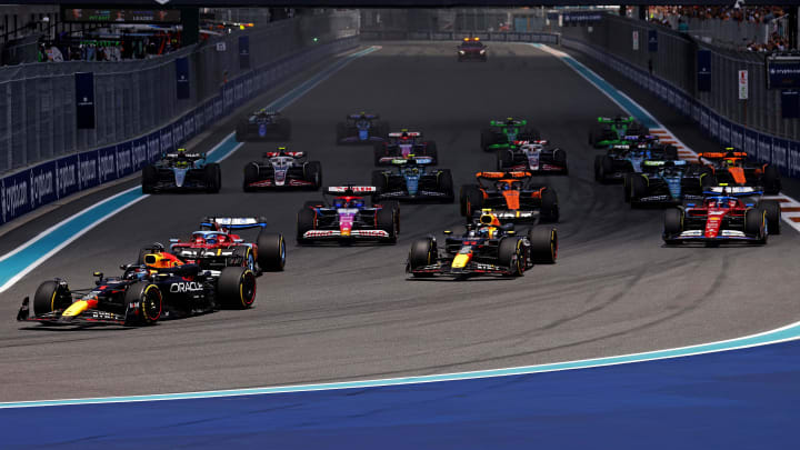 May 4, 2024; Miami Gardens, Florida, USA; Red Bull Racing driver Max Verstappen (1) leads the start of the F1 Sprint Race at Miami International Autodrome. Mandatory Credit: Peter Casey-USA TODAY Sports