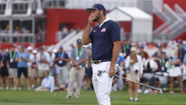 Team USA golfer Scottie Scheffler reacts to a putt on the 16th hole on the penultimate day of competition for the Ryder Cup
