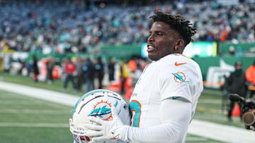 Jan 5, 2025; East Rutherford, New Jersey, USA; Miami Dolphins wide receiver Tyreek Hill (10) on the field before the game against the New York Jets at MetLife Stadium. Mandatory Credit: Vincent Carchietta-Imagn Images