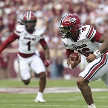 Nov 15, 2025; College Station, Texas, USA; South Carolina Gamecocks quarterback Lanorris Sellers (16) runs with the ball during the first quarter against the Texas A&M Aggies at Kyle Field. Mandatory Credit: Troy Taormina-Imagn Images