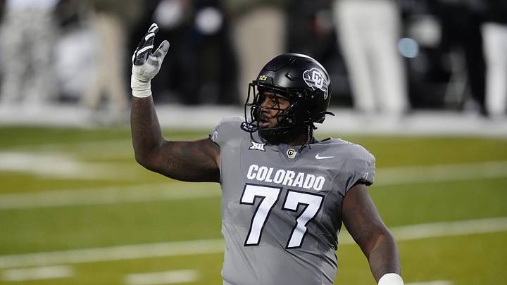 Nov 1, 2025; Boulder, Colorado, USA; Colorado Buffaloes offensive lineman Jordan Seaton (77) reacts to a penalty called during the second quarter against the Arizona Wildcats at Folsom Field. Mandatory Credit: Ron Chenoy-Imagn Images