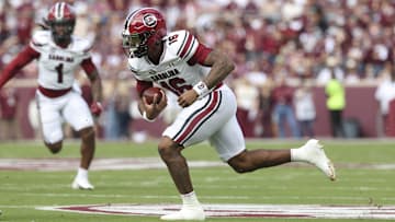Nov 15, 2025; College Station, Texas, USA; South Carolina Gamecocks quarterback Lanorris Sellers (16) runs with the ball during the first quarter against the Texas A&M Aggies at Kyle Field. Mandatory Credit: Troy Taormina-Imagn Images