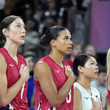 Aug 6, 2024; Paris, France; Team USA during the national anthem before the game against Poland during the Paris 2024 Olympic Summer Games at South Paris Arena 1.