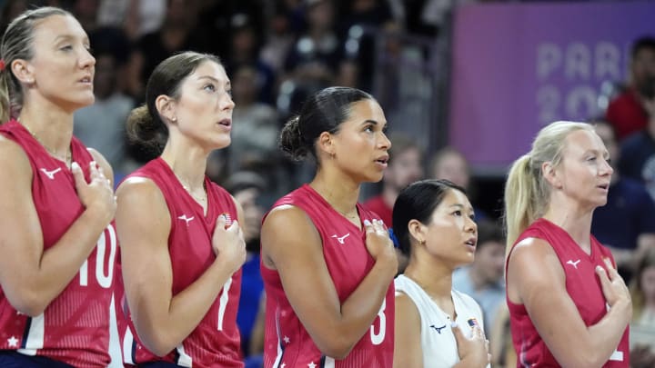 Aug 6, 2024; Paris, France; Team USA during the national anthem before the game against Poland during the Paris 2024 Olympic Summer Games at South Paris Arena 1.