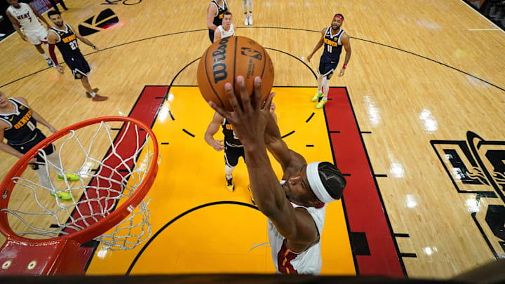 Miami Heat forward Jimmy Butler (22) dunks against the Denver Nuggets during the 2023 NBA Finals.