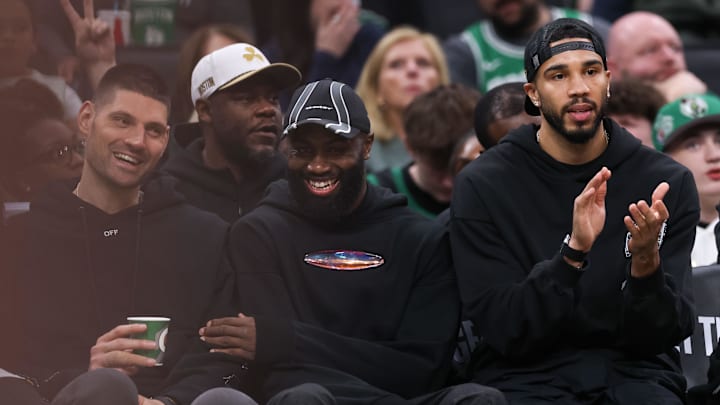 Apr 12, 2026; Boston, Massachusetts, USA; Boston Celtics forward Jayson Tatum (0) and Boston Celtics forward Jaylen Brown (7) react during the first half against the Orlando Magic at TD Garden. Mandatory Credit: Paul Rutherford-Imagn Images