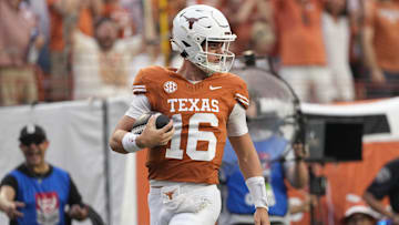 Sep 14, 2024; Austin, Texas, USA; Texas Longhorns quarterback Arch Manning (16) runs for a 67 yard touchdown during the first half against the Texas-San Antonio Roadrunners at Texas at Darrell K Royal-Texas Memorial Stadium. Mandatory Credit: Scott Wachter-Imagn Images