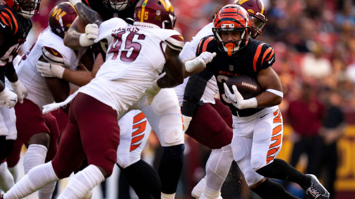 Cincinnati Bengals running back Jacob Saylors (34) runs with the ball in the second quarter of the NFL preseason week 3 game between the Cincinnati Bengals and the Washington Commanders at FedEx Field in Landover, M.D., on Saturday, Aug. 26, 2023.