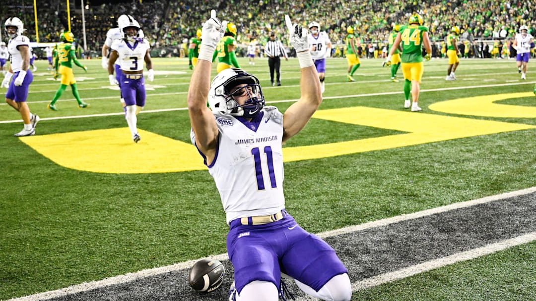 Dec 20, 2025; Eugene, OR, USA; James Madison Dukes wide receiver Nick Degennaro (11) celebrates after scoring a touchdown during the third quarter against the Oregon Ducks at Autzen Stadium. Mandatory Credit: Troy Wayrynen-Imagn Images