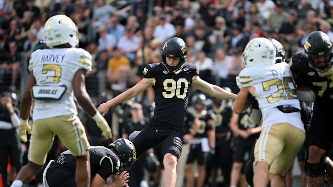 Sep 27, 2025; Winston-Salem, North Carolina, USA;  Wake Forest Demon Deacons kicker Connor Calvert (90) kicks a field goal during the fourth quarter against the Georgia Tech Yellow Jackets at Allegacy Federal Credit Union Stadium. Mandatory Credit: Zachary Taft-Imagn Images