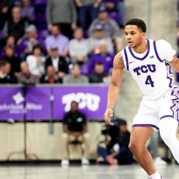 Mar 9, 2024; Fort Worth, Texas, USA;  TCU Horned Frogs guard Jameer Nelson Jr. (4) controls the ball during the first half against the UCF Knights at Ed and Rae Schollmaier Arena. Mandatory Credit: Kevin Jairaj-USA TODAY Sports