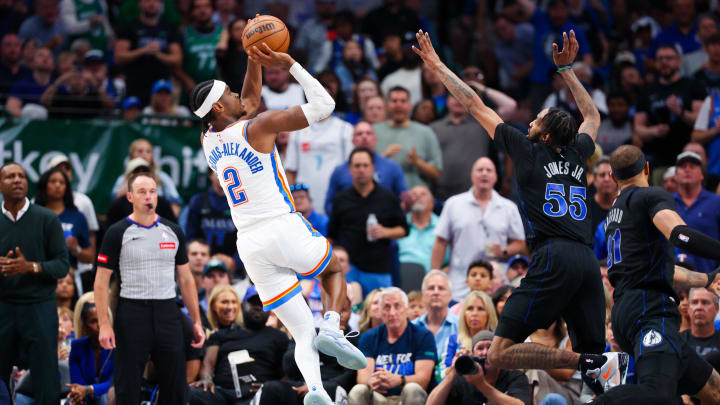 May 18, 2024; Dallas, Texas, USA;  Oklahoma City Thunder guard Shai Gilgeous-Alexander (2) shoots over Dallas Mavericks forward Derrick Jones Jr. (55) during the second half in game six of the second round of the 2024 NBA playoffs at American Airlines Center. Mandatory Credit: Kevin Jairaj-USA TODAY Sports