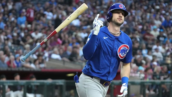 Mar 29, 2025; Phoenix, Arizona, USA; Chicago Cubs outfielder Kyle Tucker (30) hits a two-run home run against the Arizona Diamondbacks in the fifth inning at Chase Field Mar 29, 2025; Phoenix, Arizona, USA; Chicago Cubs outfielder Kyle Tucker (30) hits a two-run home run against the Arizona Diamondbacks in the fifth inning at Chase Field