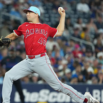 Jul 4, 2025; Toronto, Ontario, CAN; Los Angeles Angels relief pitcher Brock Burke (46) throws a pitch against the Toronto Blue Jays during the seventh inning at Rogers Centre. Mandatory Credit: Nick Turchiaro-Imagn Images
