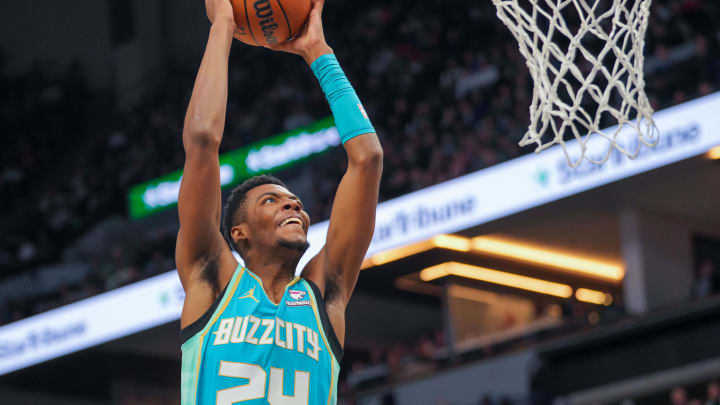 Jan 22, 2024; Minneapolis, Minnesota, USA; Charlotte Hornets forward Brandon Miller (24) dunks against the Minnesota Timberwolves in the third quarter at Target Center. Mandatory Credit: Brad Rempel-USA TODAY Sports