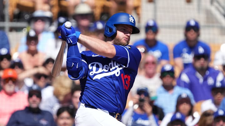 Los Angeles Dodgers third base Max Muncy (13) bats against the Arizona Diamondbacks during the first inning at Camelback Ranch-Glendale on March 10.