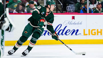 Jan 15, 2024; Saint Paul, Minnesota, USA; Minnesota Wild defenseman Daemon Hunt (48) looks to pass during the first period against the New York Islanders at Xcel Energy Center. Mandatory Credit: Brace Hemmelgarn-Imagn Images